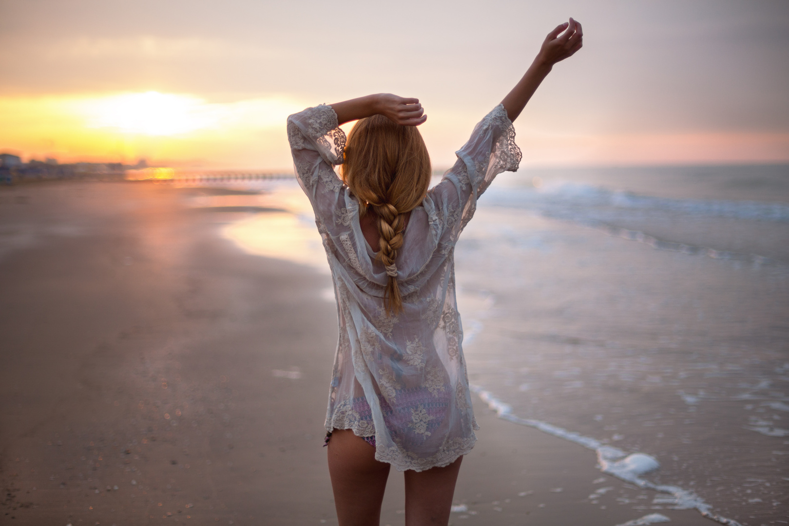 Dreamy girl on beach